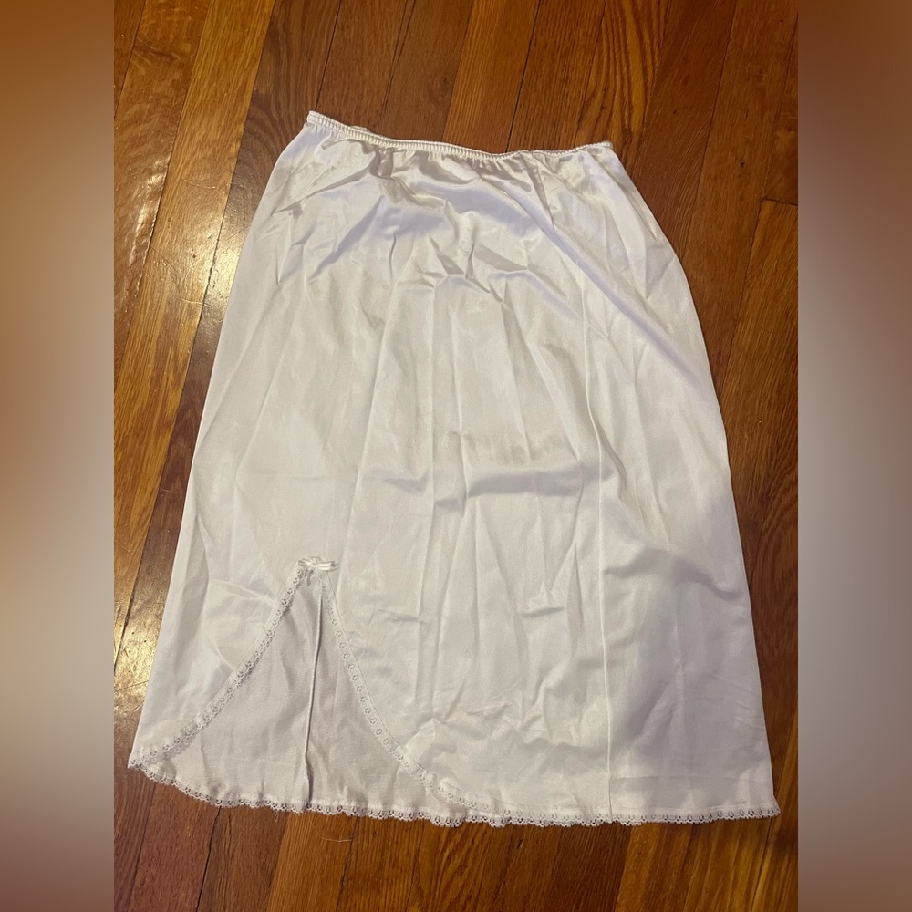White lacy midi skirt with bow detail!